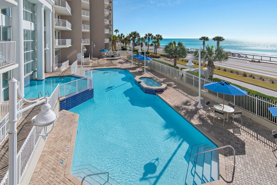 Majestic Sun has a large pool, heated indoor pool, two hot tubs on the elevated, and spacious patio with plenty of seating and shade overlooking the shimmering Gulf of Mexico.