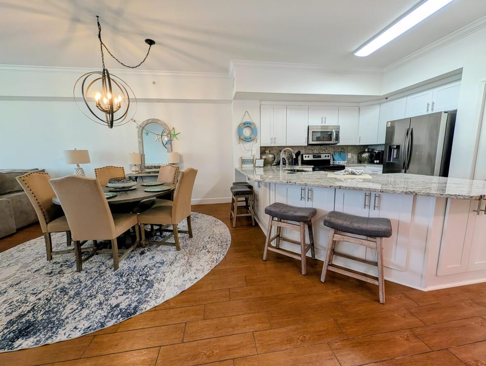 Bright, open kitchen and dining area with modern finishes