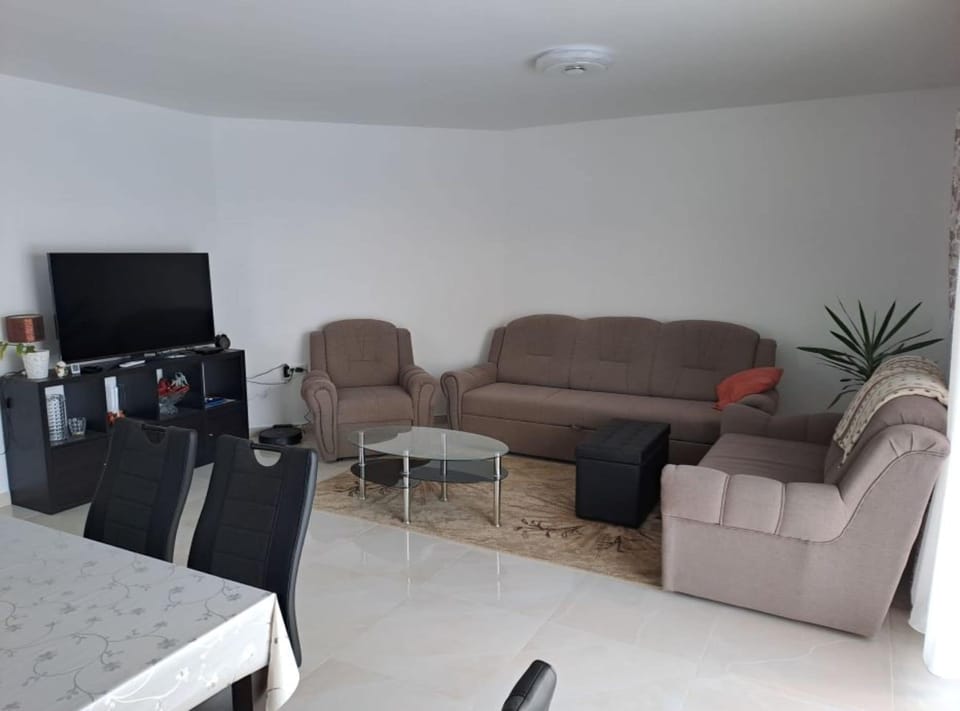 Apartment (Two Bedroom Apartment) | Living room | 32-inch flat-screen TV with digital channels