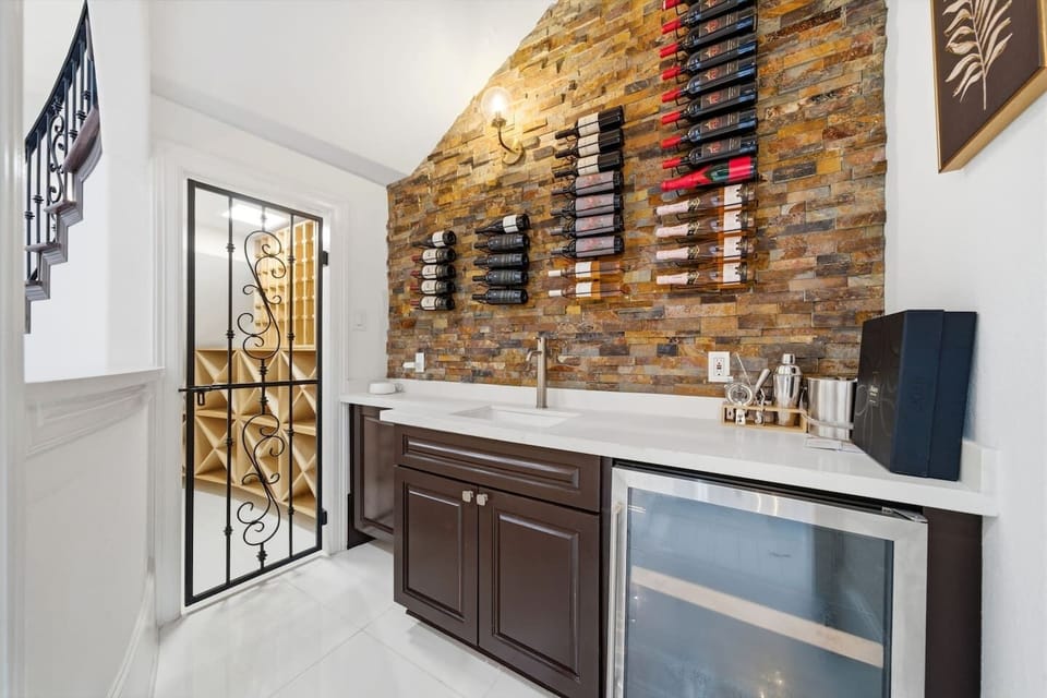 Beautiful Wine Cellar just off the dining room, creating a sophisticated atmosphere for meals and gatherings.