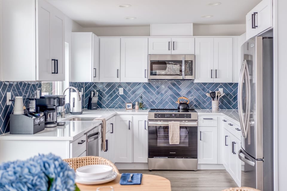 Kitchen Delight: Whip up culinary masterpieces in this stylish, modern space with stunning accents!