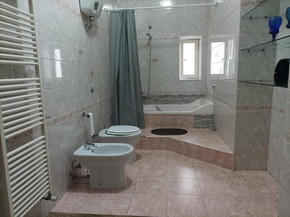 Deluxe Quadruple Room, Balcony | Bathroom | Hair dryer, bidet, towels, soap