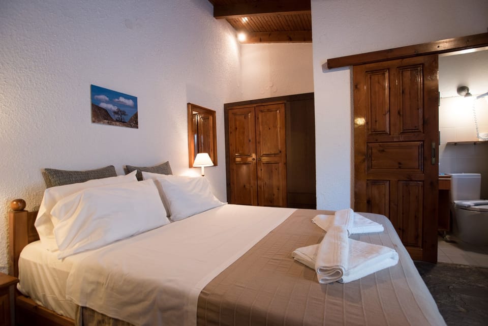 Apartment, 1 Bedroom | In-room safe, individually decorated, desk, iron/ironing board