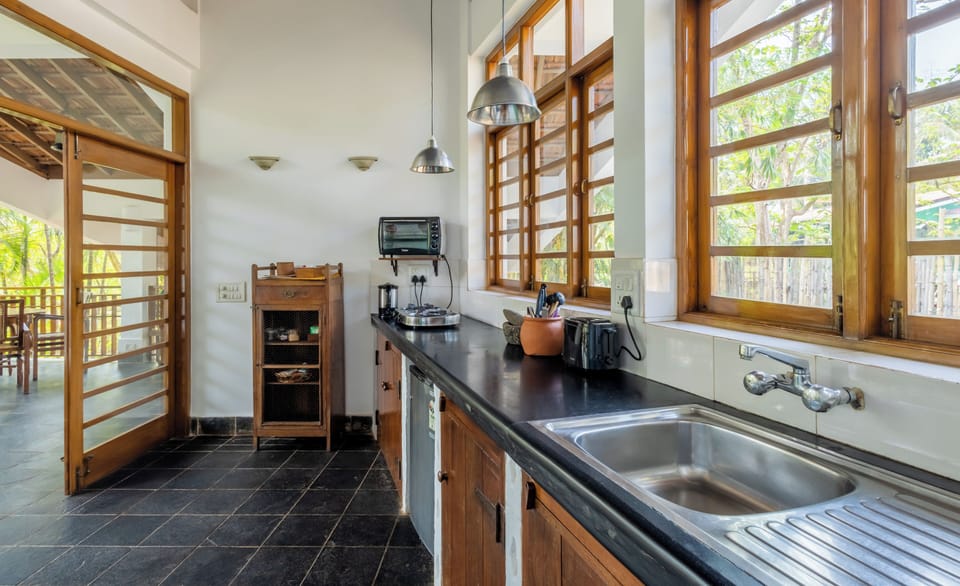 Villa, 2 Bedrooms, Private Pool, Garden View | Private kitchen | Dining tables