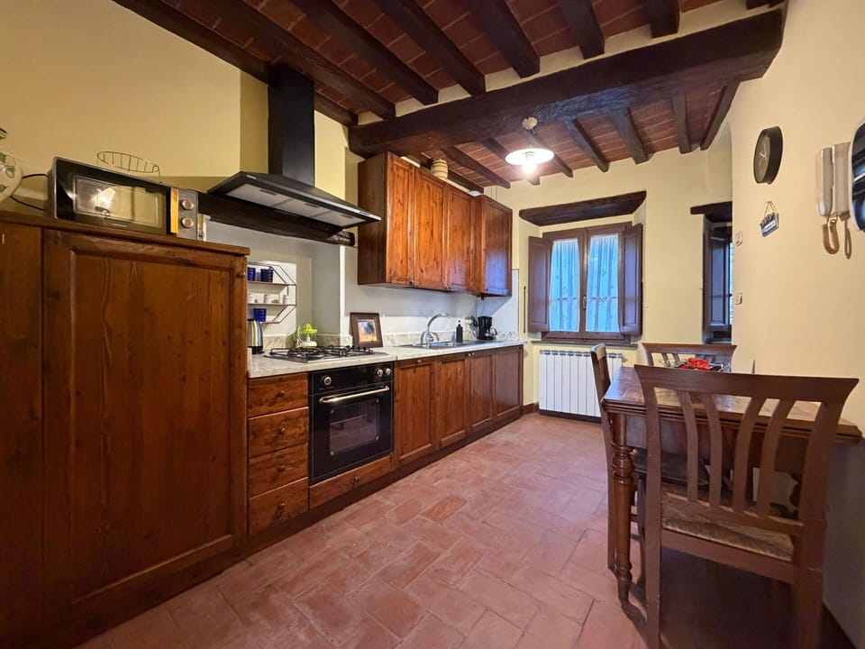 Furniture, Wood, Interior Design, Flooring, Ceiling, Countertop, Cabinetry, Floor, Kitchen, Room