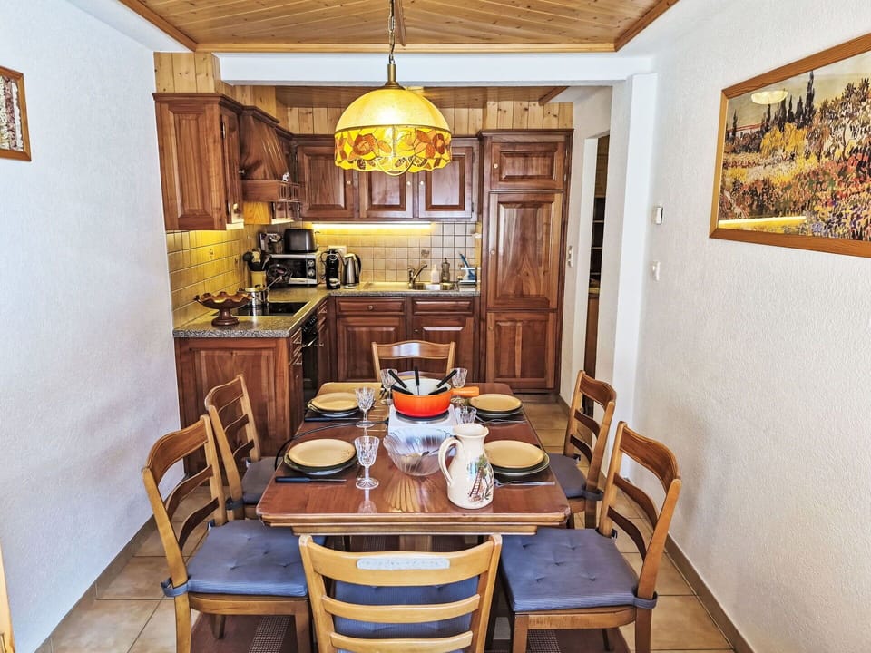 Furniture, Interior Design, Flooring, Wood, Floor, Ceiling, Room, Table, Lighting, Chair