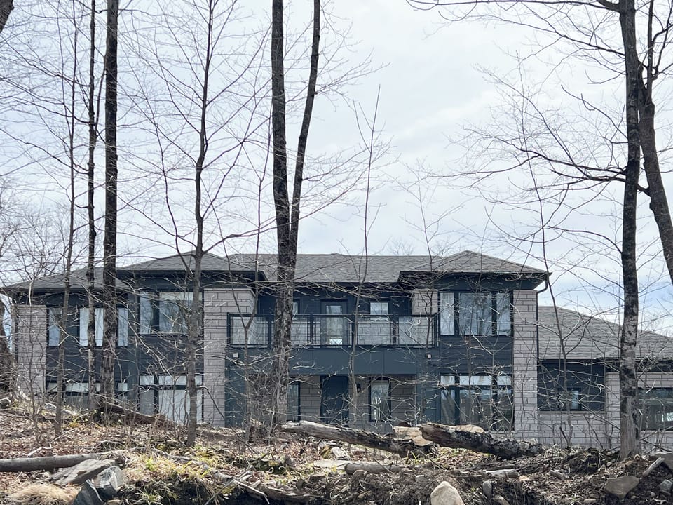 View of the front of the  3500 sq ft house in late fall