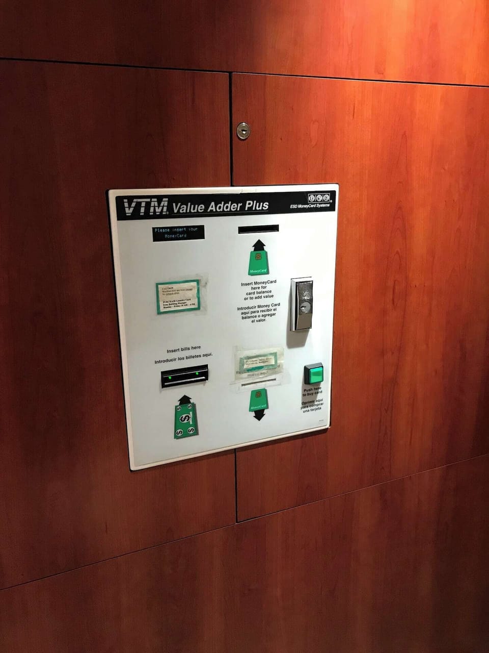 Load money on laundry cards using this machine in the lobby area across from the mailboxes.