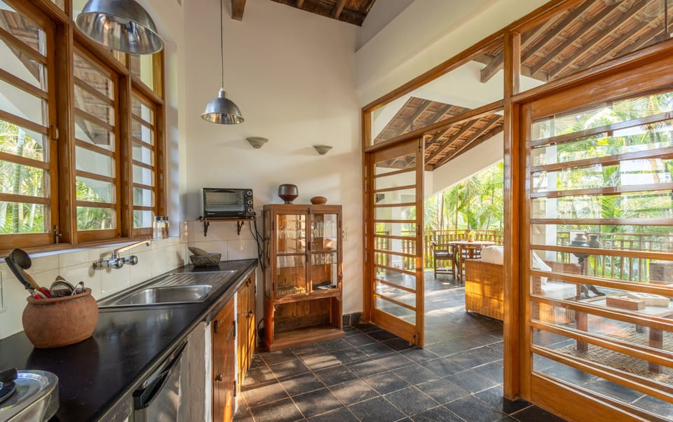 Villa, 2 Bedrooms, Private Pool, Garden View | Private kitchen | Electric kettle, dining tables