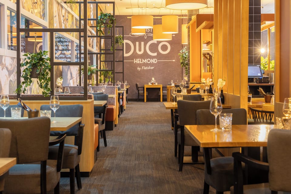 Toast the evening in our cozy restaurant with ambient glow.