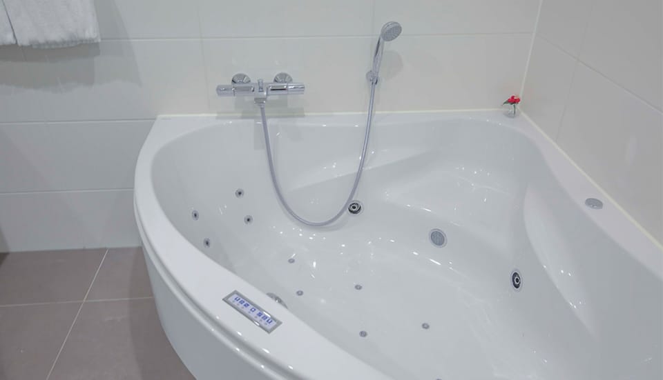 Sink into the whirlpool tub after a day exploring.