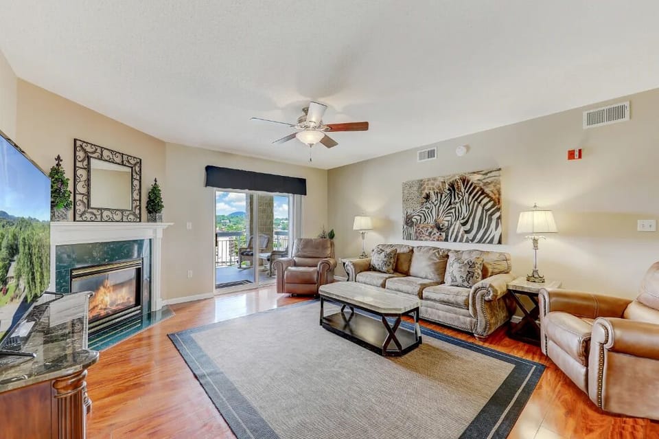 Spacious Living Room with Gas Fireplace, Sleeper Sofa and SMART TV with Cable & WIFI throughout vacation rental