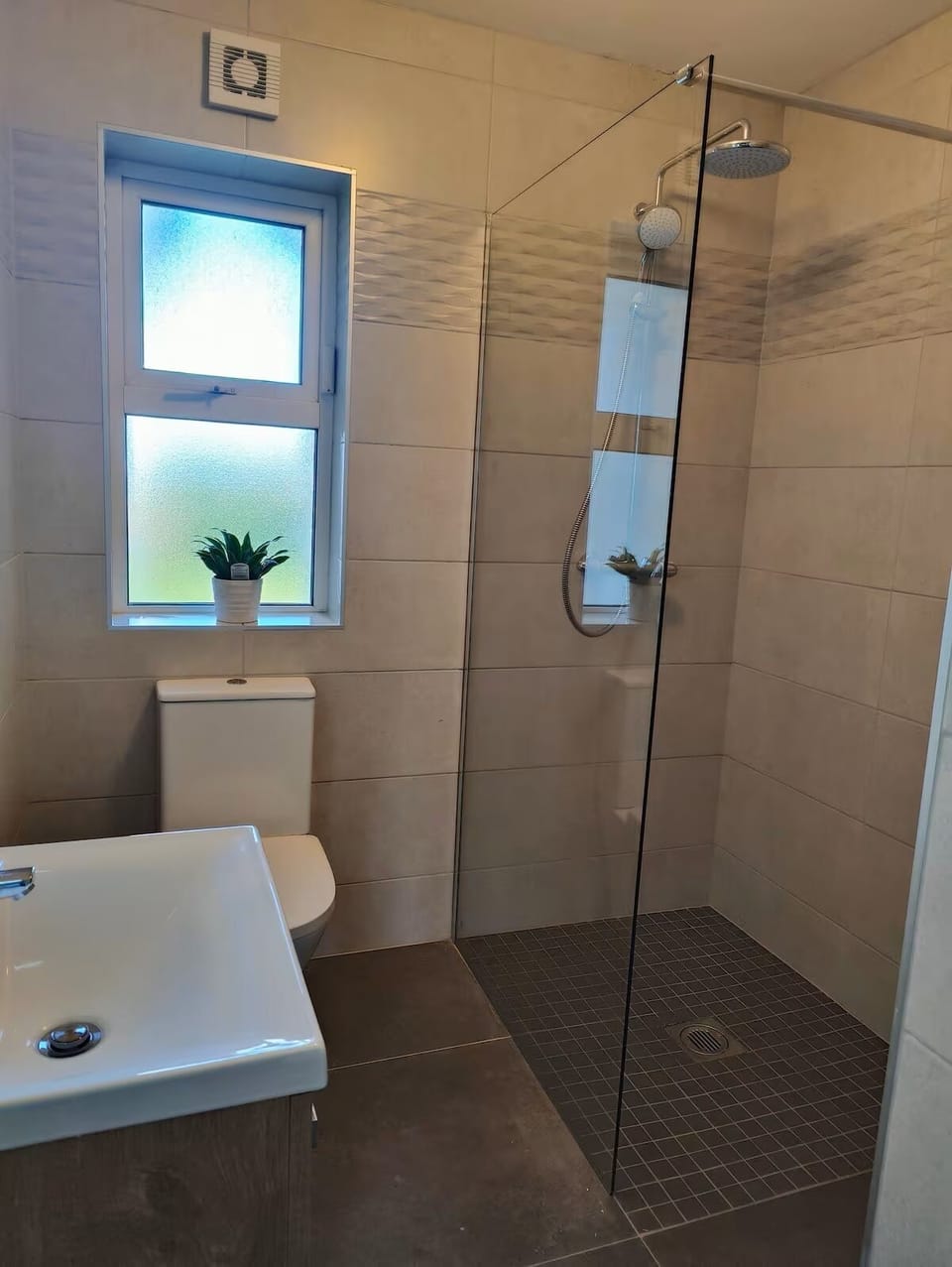 Main bathroom, wet room with rainfall shower.