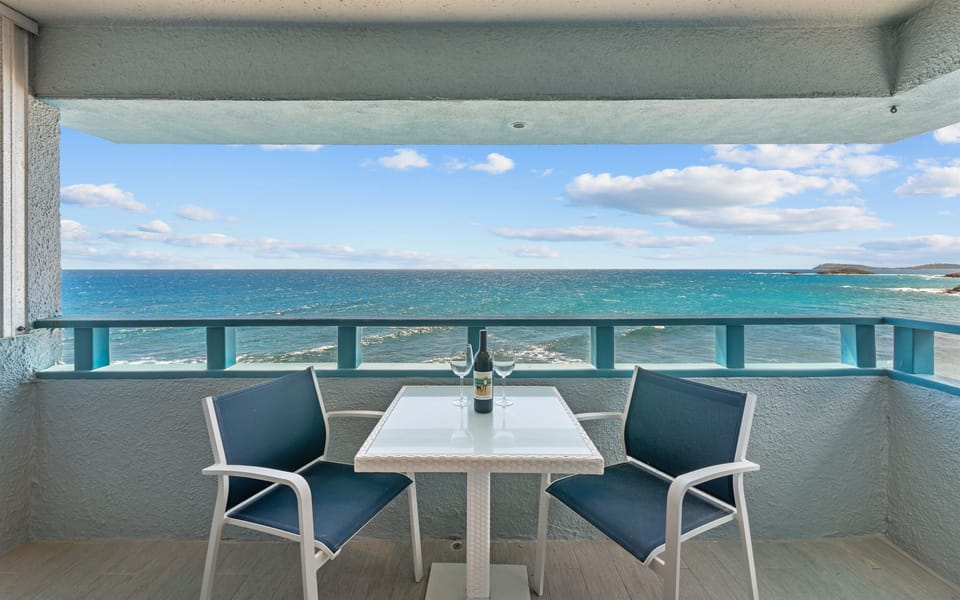 Enjoy a cup of coffee on your balcony with stunning views of the water.