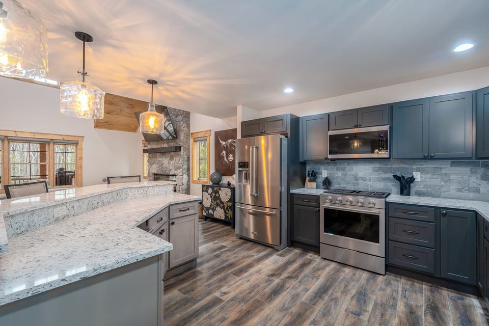 The kitchen has a gas stove, microwave and dishwasher.
