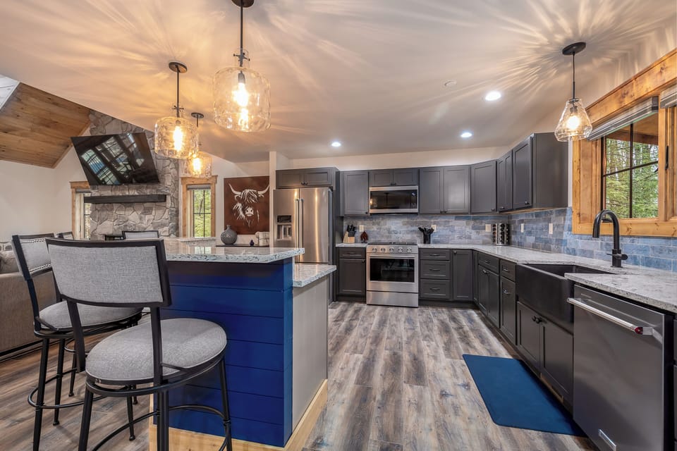 The kitchen island has seating for 4.