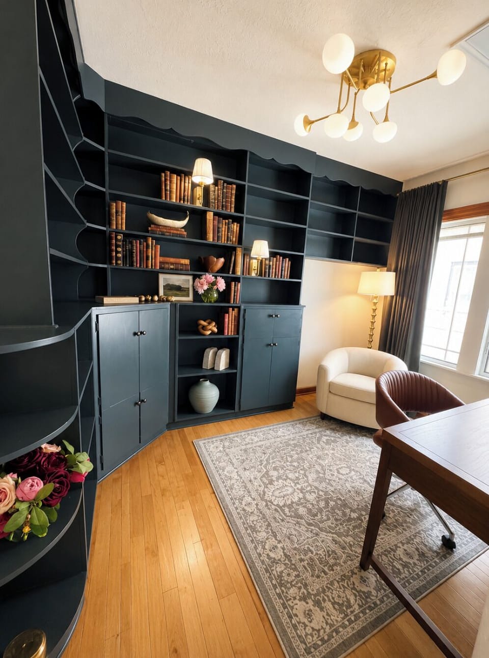 Main floor office with built-in shelving, comfortable seating, and a dedicated workspace. This flexible room can be converted to an extra twin bedroom upon request, offering added sleeping space while maintaining a quiet retreat.