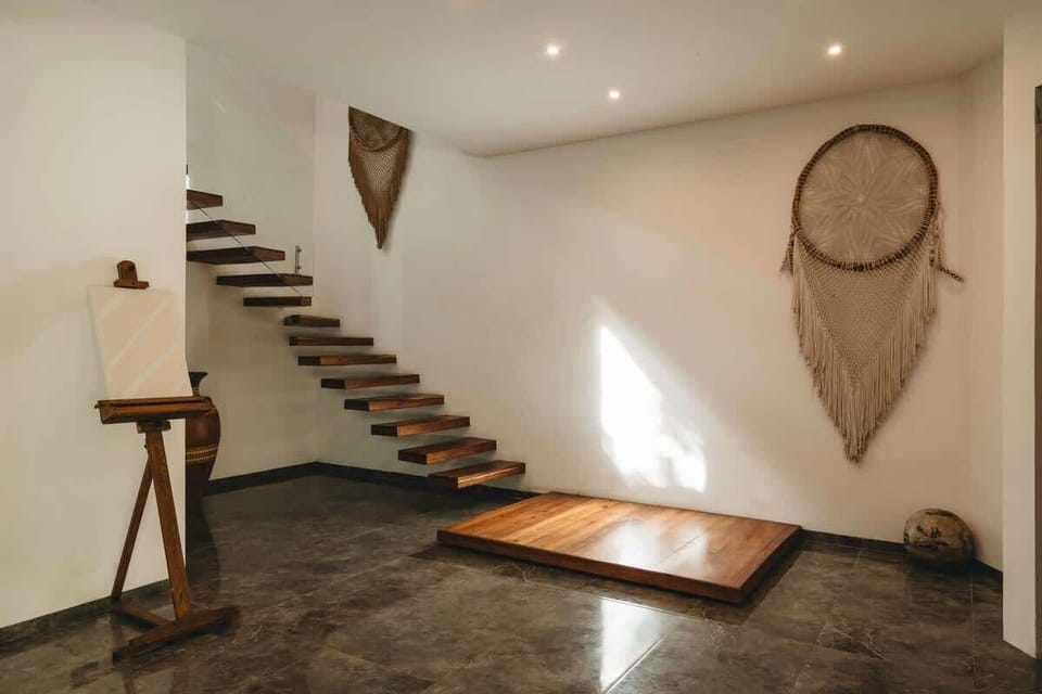 Entrance door and stairs to the second floor.