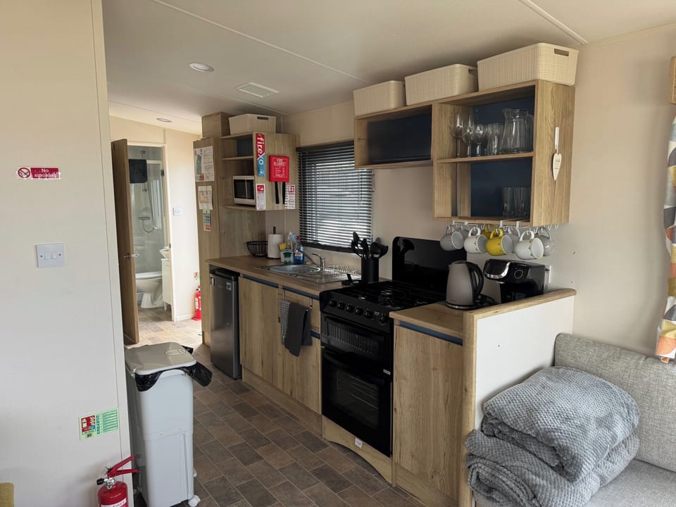 A well‑equipped, modern kitchen with everything to help you to cook, dine, and feel right at home during your stay.