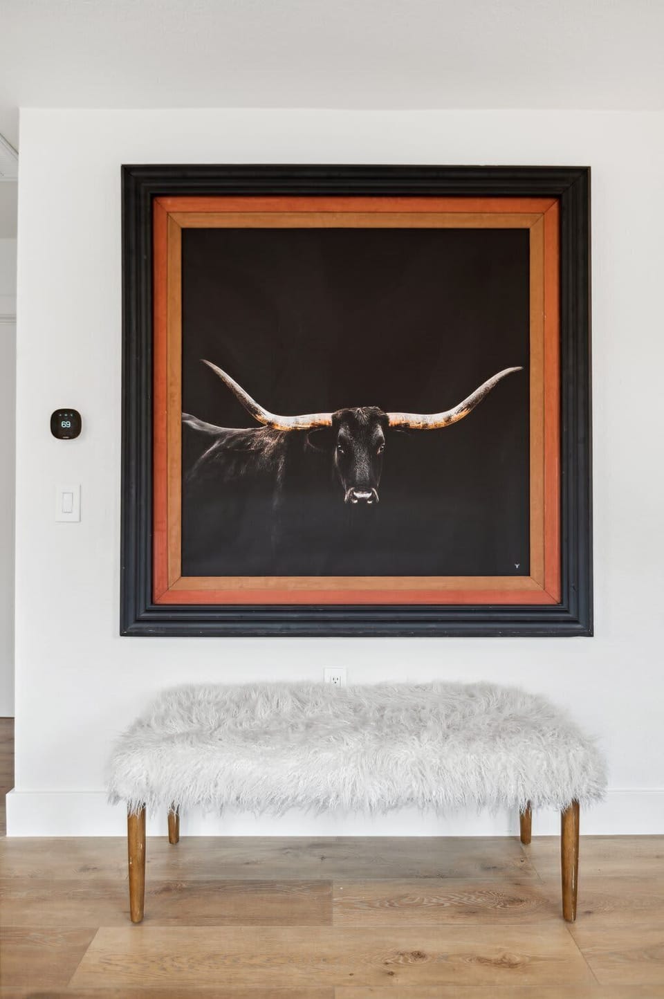Texas-inspired artwork welcomes you into a home full of character and charm.
