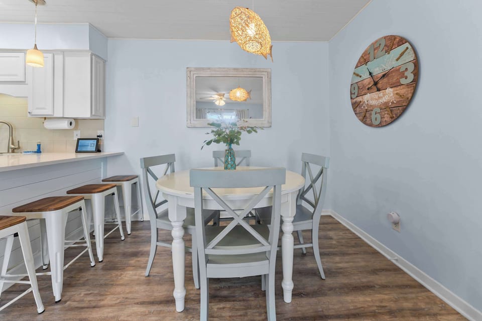 Open kitchen and dining layout keeps everyone connected throughout your stay.