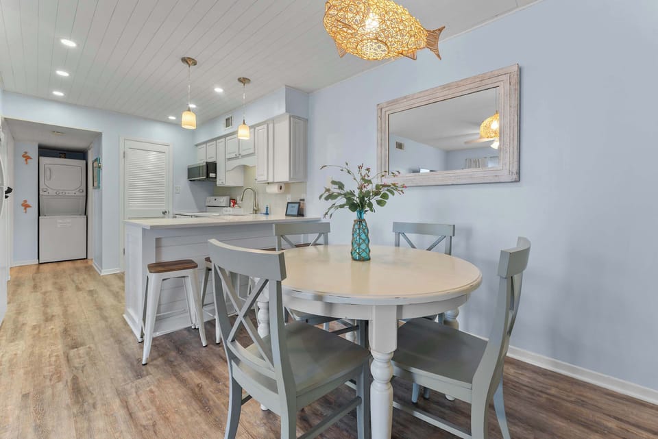 Dining area just off the kitchen creates a simple and comfortable space to gather.