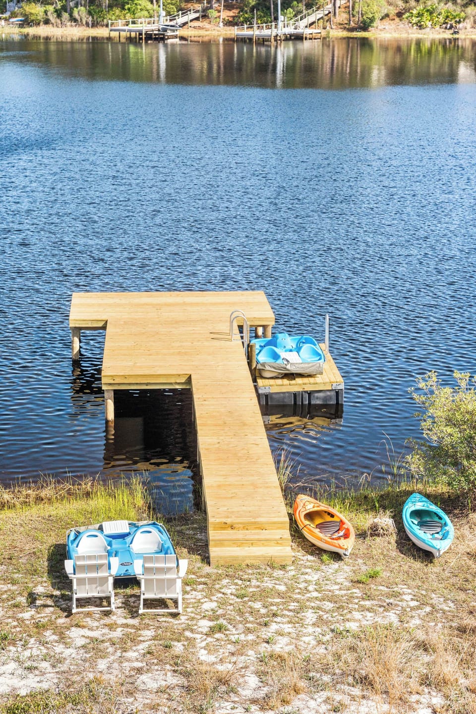 Launch a kayak or pedal boat from the private dock for a peaceful afternoon on the lake