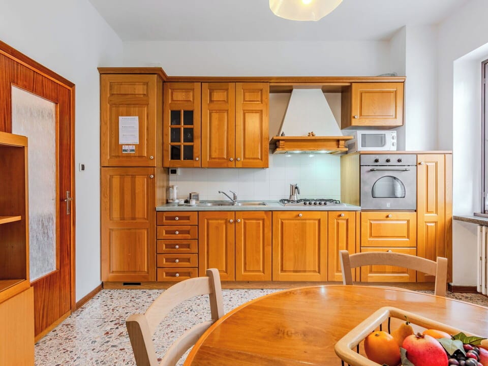 Kitchen, Wood, Furniture, Cabinetry, Flooring, Interior Design, Major Appliance, Countertop, Kitchen Appliance, Cupboard