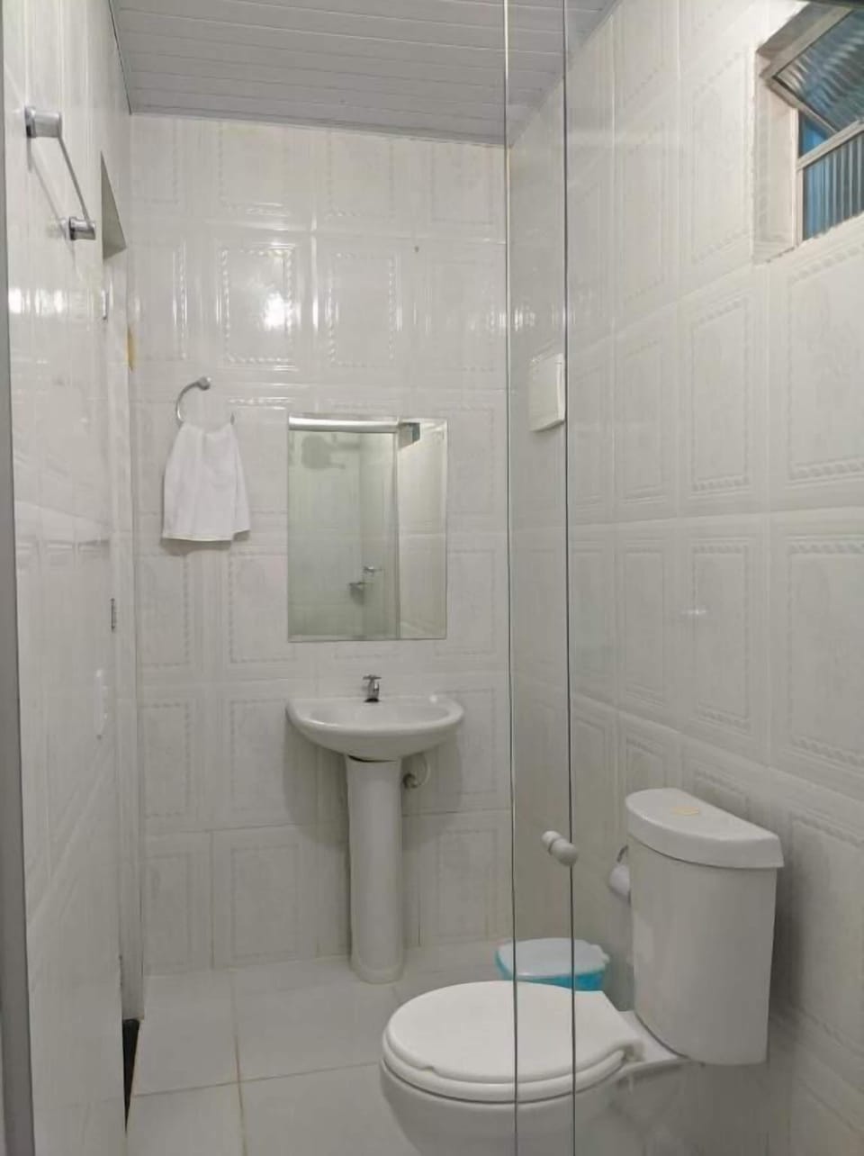 Shower, towels, soap, toilet paper