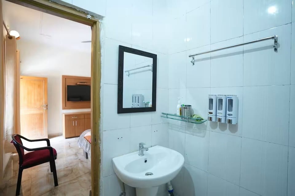 Shower, slippers, towels, soap
