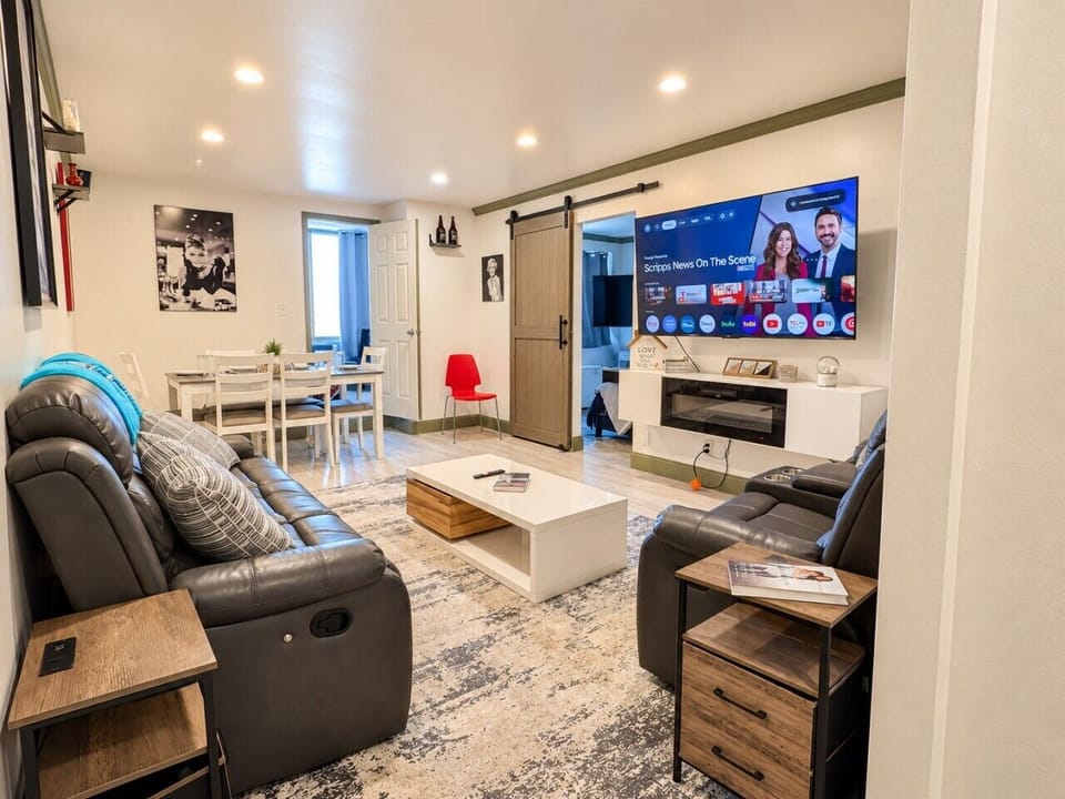 Spacious living room with comfortable seating, Smart TV, and plenty of room to relax, gather, and enjoy time together.