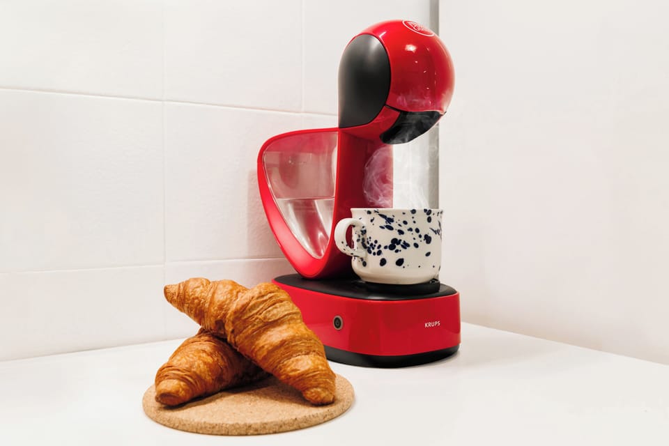 Prepare yourself a cup of coffee in the coffee machine