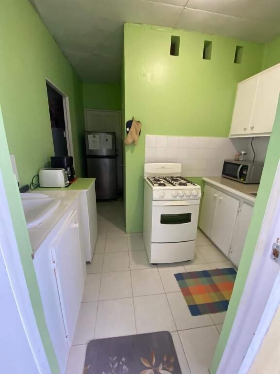 Standard Apartment, Ground Floor | Private kitchen | Fridge, microwave, oven, stovetop