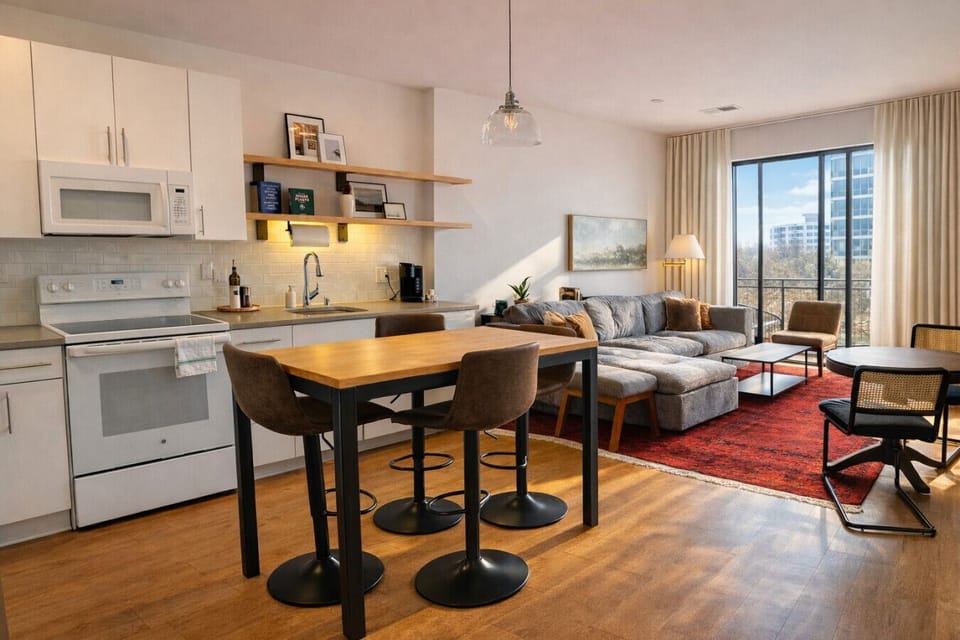 A fully-equipped kitchen with an island and bar stool seating—everything you need to prep, cook, and refuel