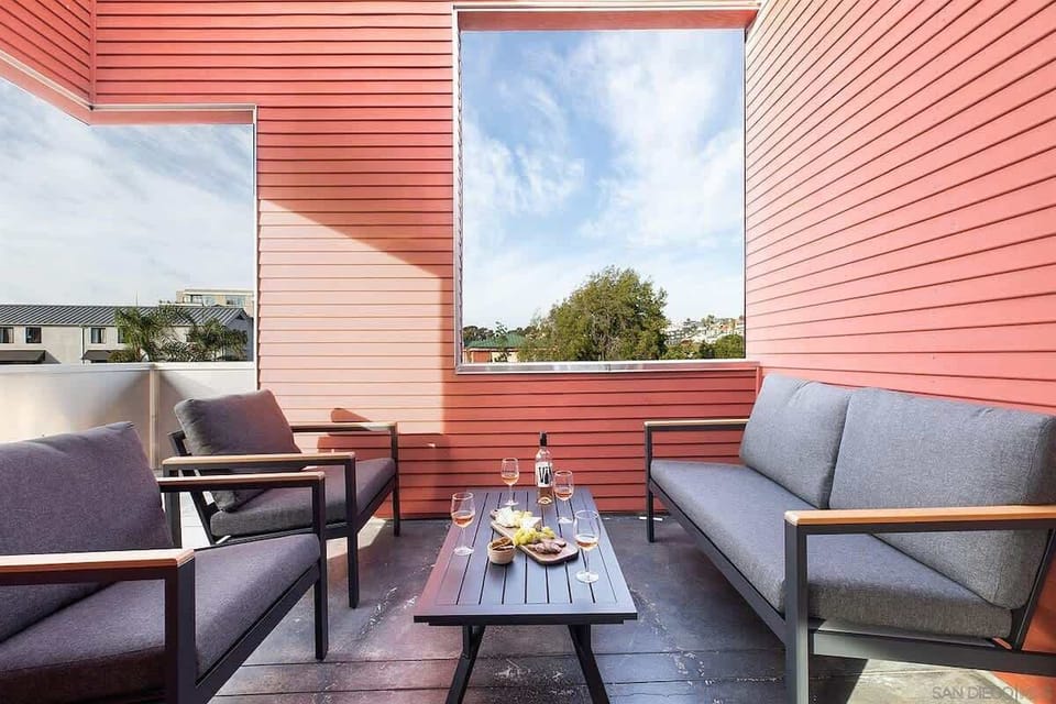 Outdoor patio with relaxed seating and vibrant surroundings