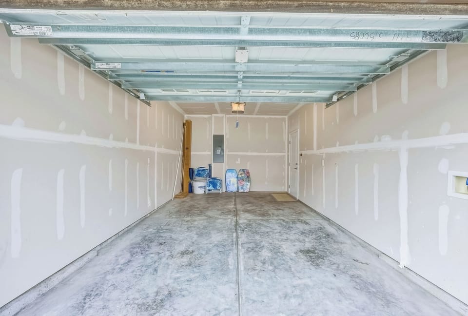 Single car garage to park a small vehicle, golf cart, or motorcycle.