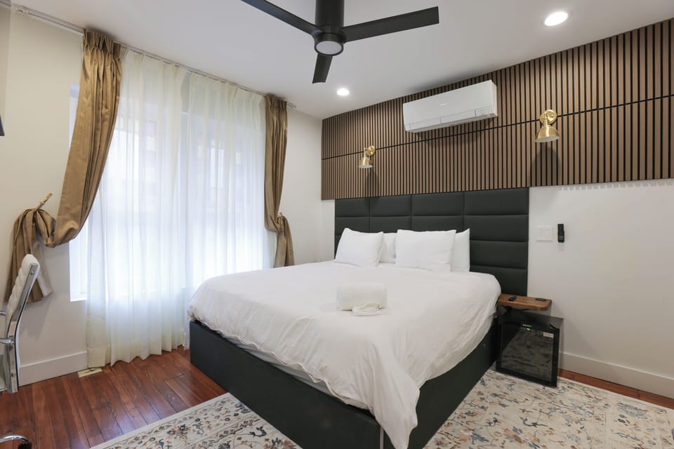 Clean and comfortable luxury room with king bed, elegant interiors at Dupont DC

