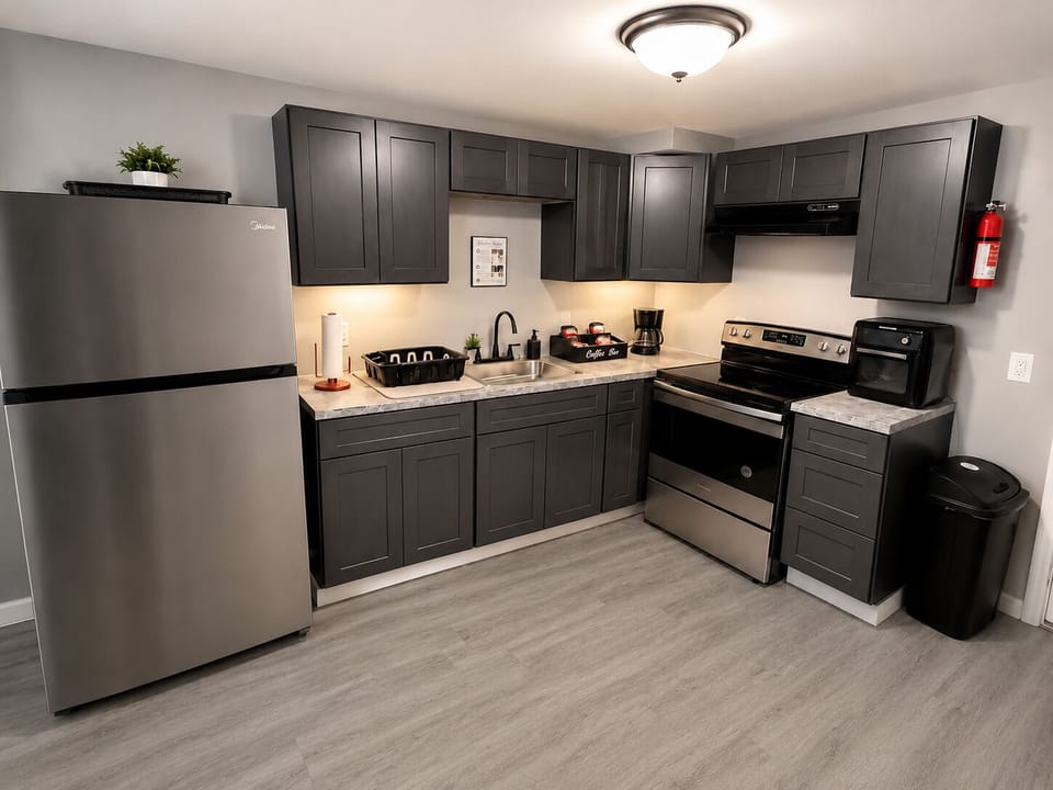 Fully equipped kitchen with full-size appliances, coffee maker and air fryer