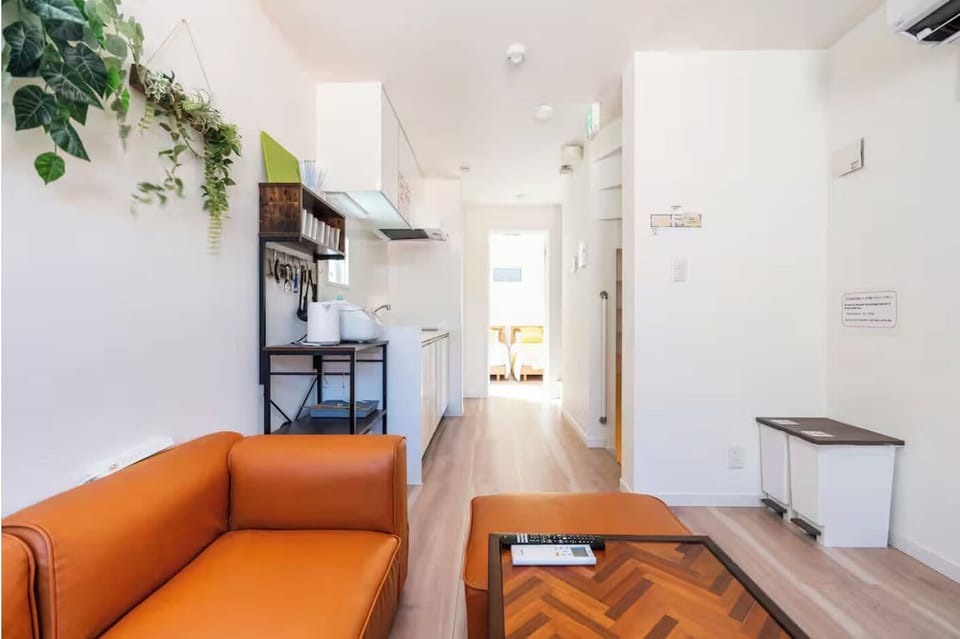 Family House, City View | Living area | Flat-screen TV