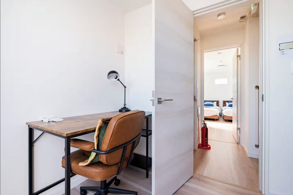 Family House, City View | Desk, blackout drapes, iron/ironing board, WiFi (free)