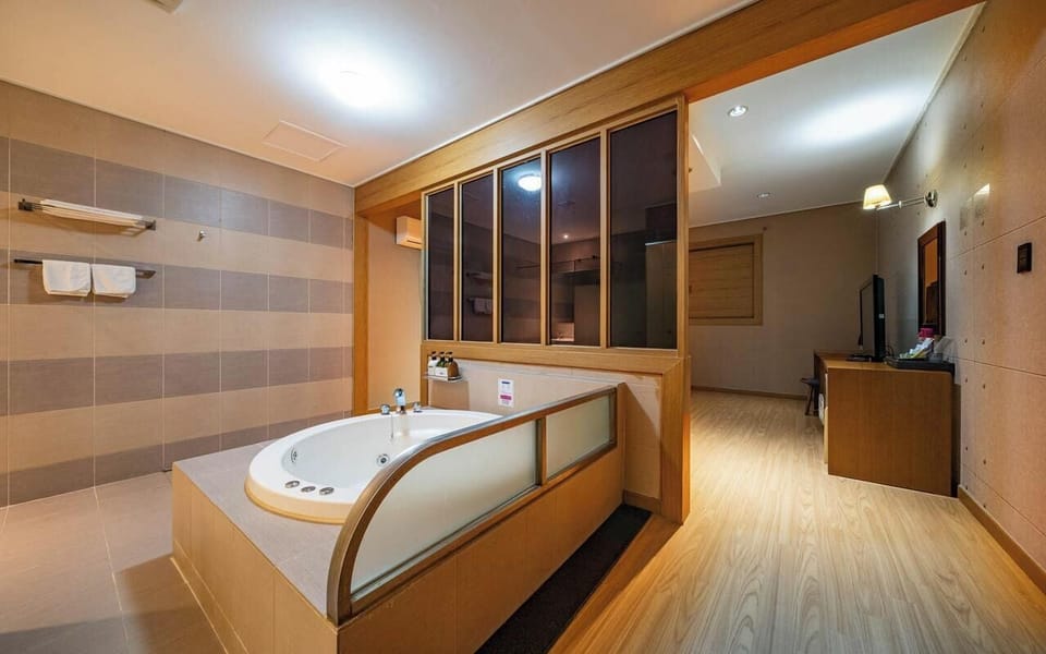 Hair dryer, slippers, towels, soap