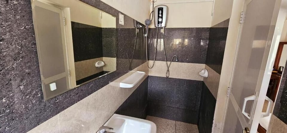 Shower, towels, soap, toilet paper