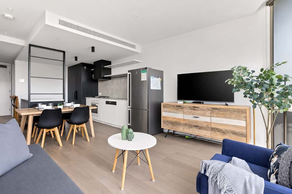 A spacious living area with a 3-seater sofa bed that folds out to a double.