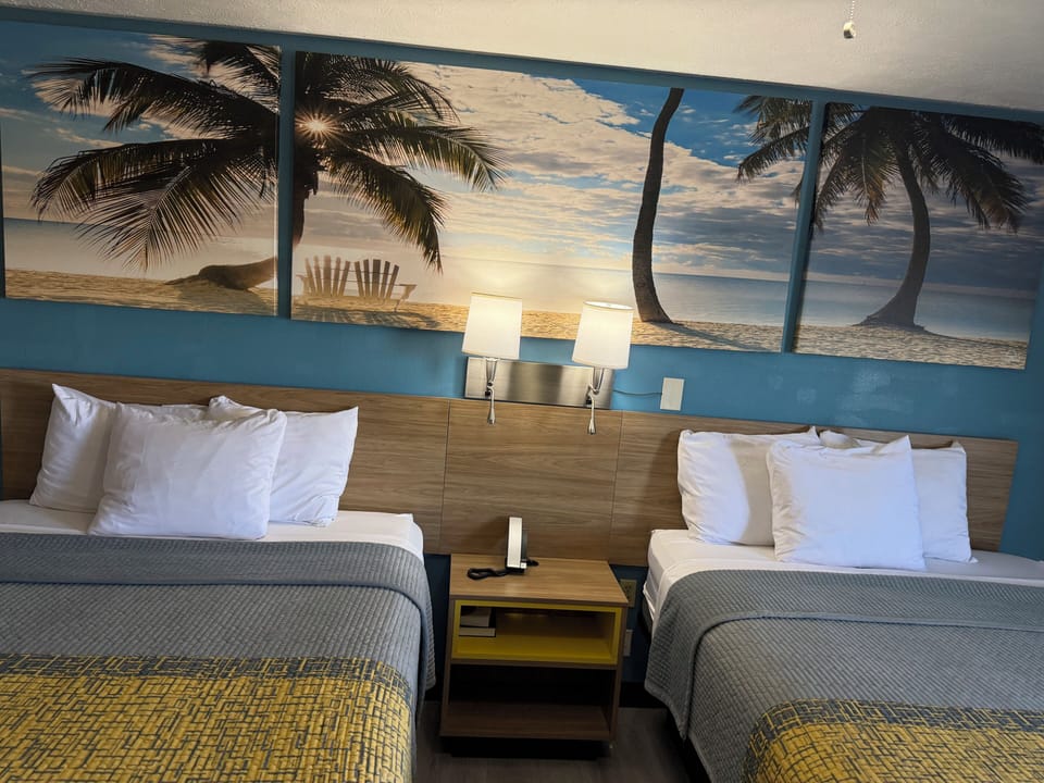 Standard Room, 2 Queen Beds, Smoking | Desk, iron/ironing board, free WiFi, bed sheets