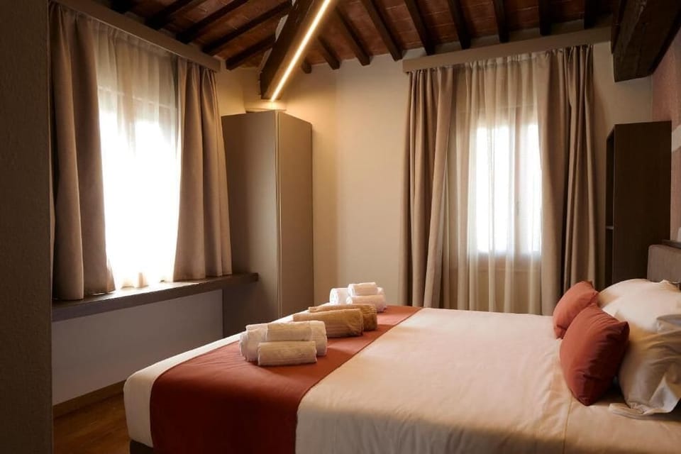 Suite, Patio, Garden View | In-room safe, desk, laptop workspace, blackout drapes