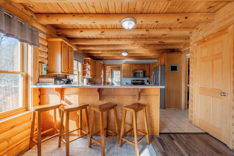 Open kitchen with breakfast bar, ideal for casual dining and conversation