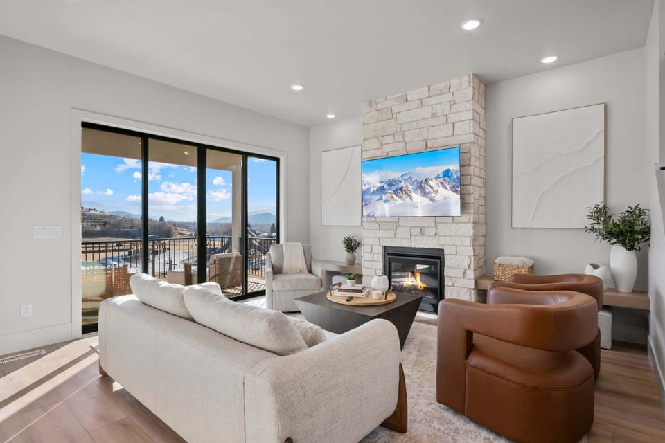 Custom furnishings and designer elements yet cozy warm feel in the primary living room