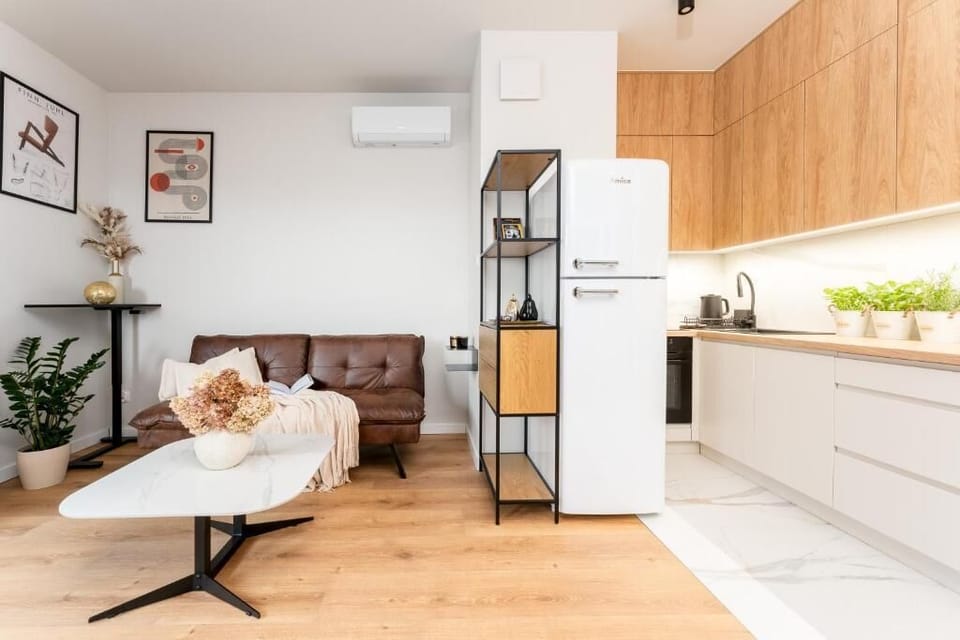 Comfort Apartment, Balcony, City View | Living area | Flat-screen TV