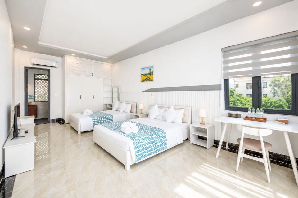 Family Room, Ocean View | Desk, bed sheets