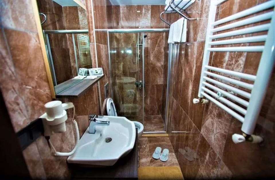 Shower, towels, soap, shampoo
